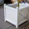 White timber planter box.